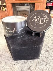 Custom engraved candle in black tin with monogram lid and Thank you side print