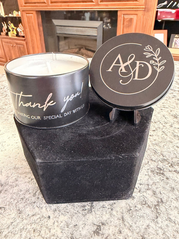 Custom engraved candle in black tin with monogram lid and Thank you side print