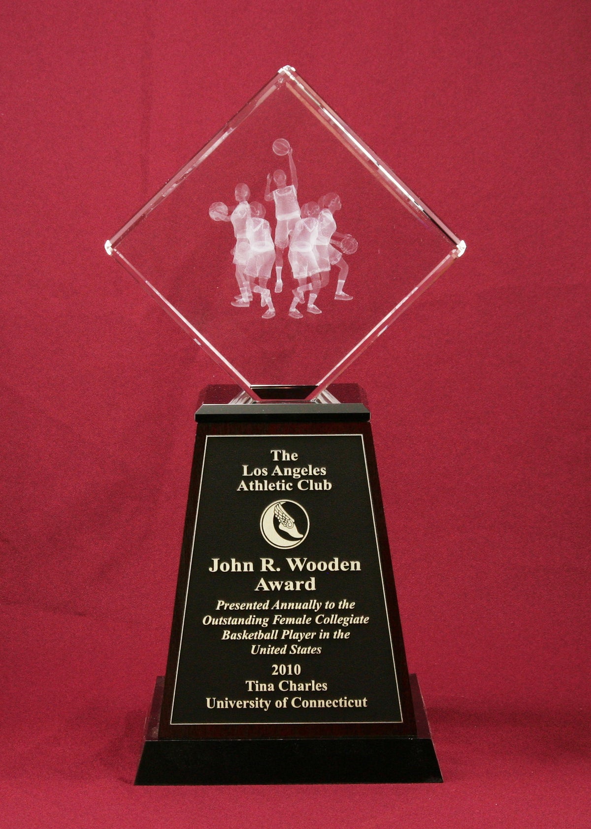 2010 John R. Wooden Award with crystal basketball figures on a tapered wood base