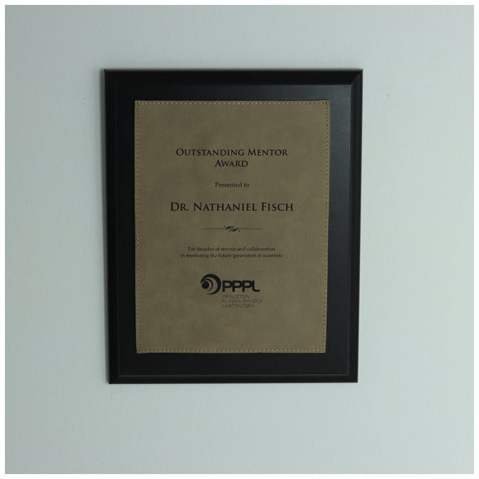 Black Economy Finish Plaque With Light Brown Lasered Leatherette Plate, shown in use