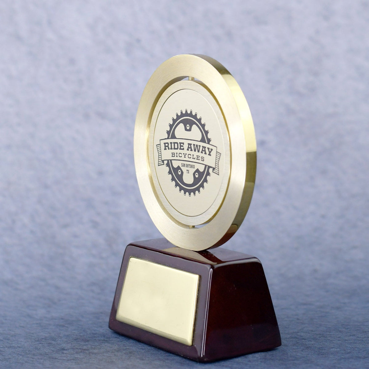 Gold Spinning Medal On Rosewood Base | Global Recognition Inc