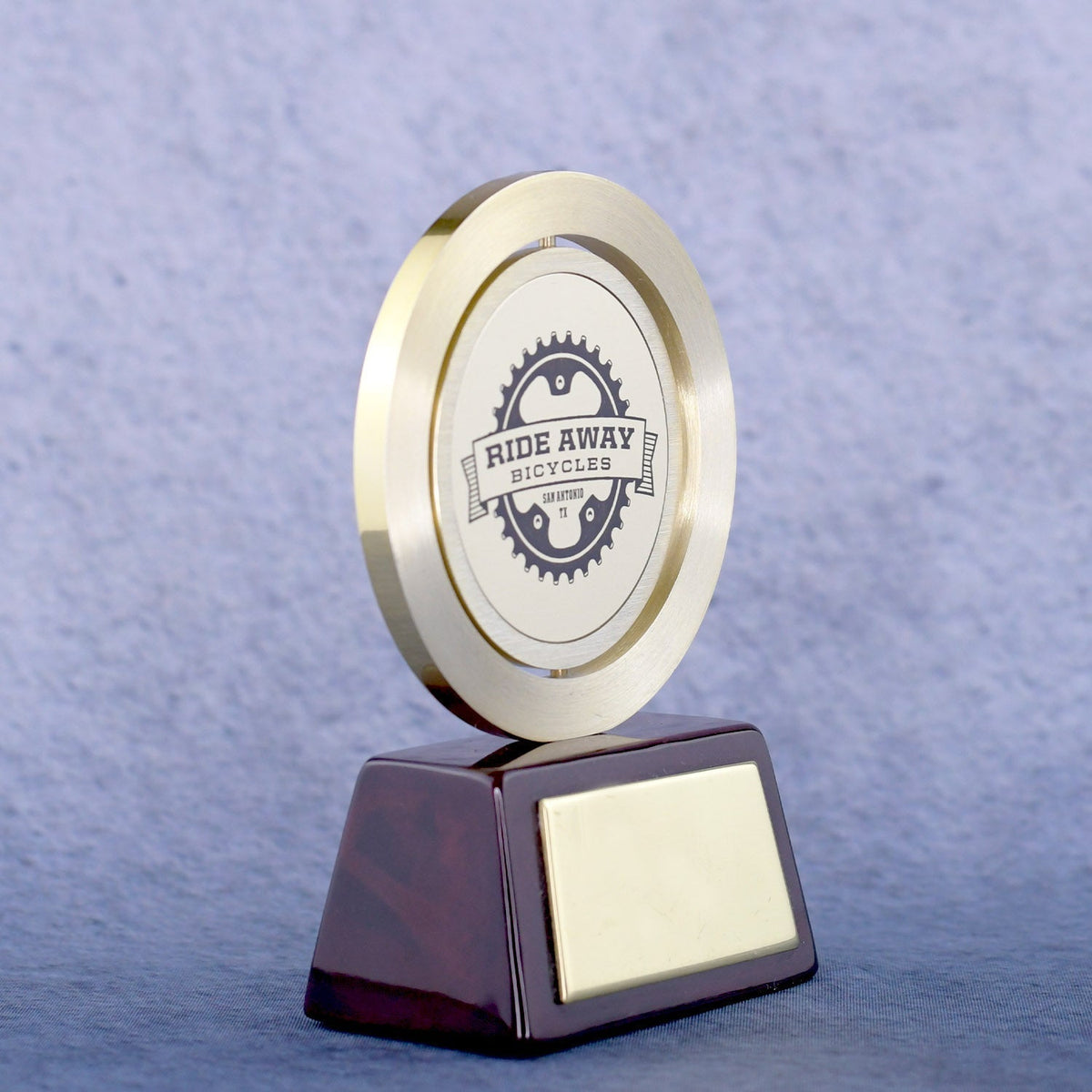 Gold Spinning Medal On Rosewood Base | Global Recognition Inc