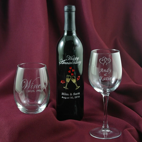 etched wine glasses and bottle