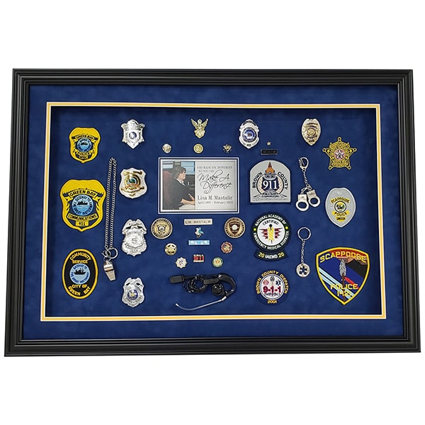 custom shadow box with badges, patches, and pins